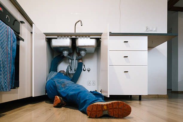 Professional Plumbing technician working in Brightwaters, NY